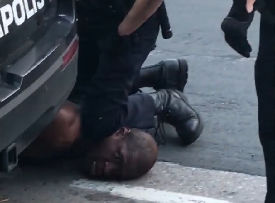 A police officer kneels on the neck of an innocent man until the man dies